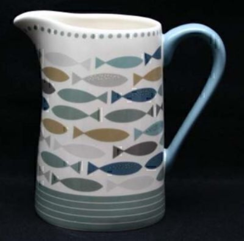 Part of the Shoreline range by Gisela Graham. Fishes Ceramic Jug in vintage blue and grey tones. Would make a great gift for new home or kitchen. Size 9x14x14cm